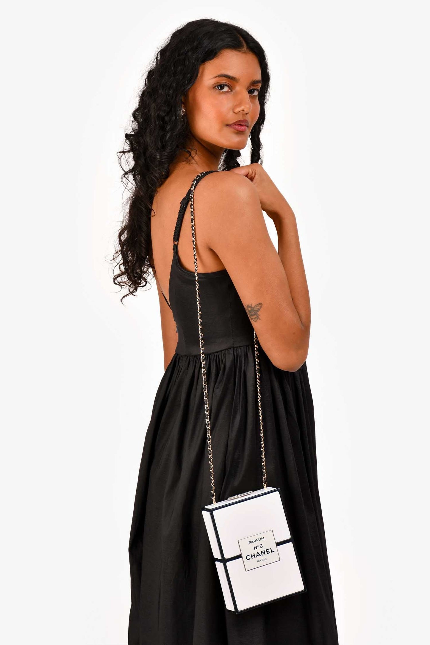 Pre-Loved Chanel™ Black/White Leather No. 5 Perfume Clutch Evening Clutch