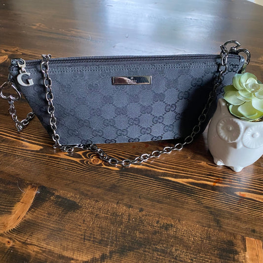 The Junco -Orvis bags GG Canvas in Black Crossbody