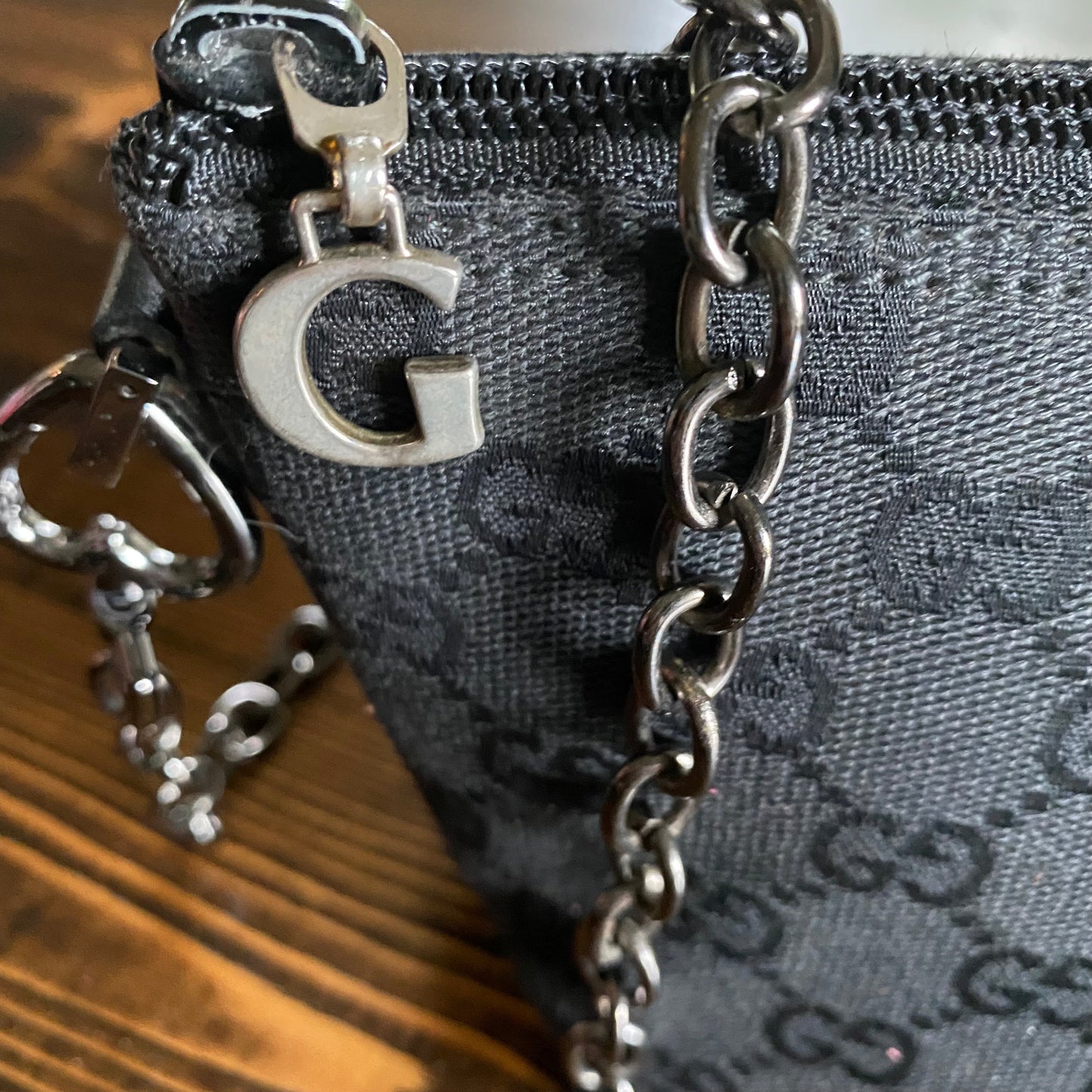 The Junco -Orvis bags GG Canvas in Black Crossbody